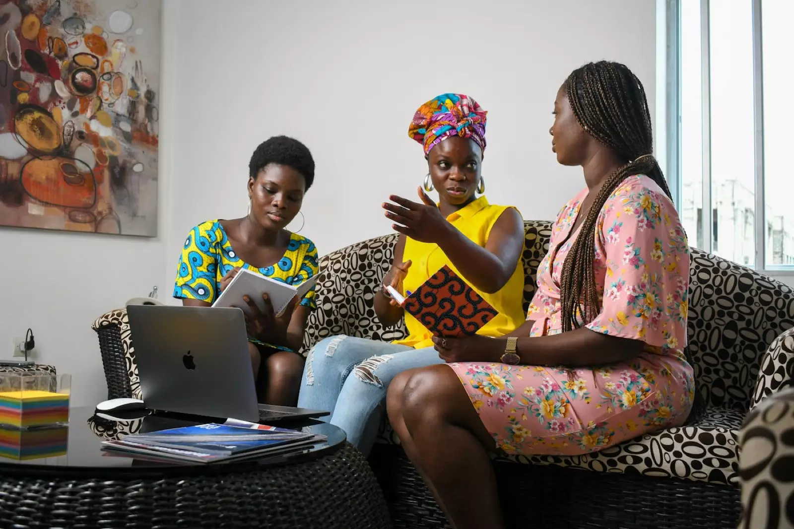 Three women planning their business together